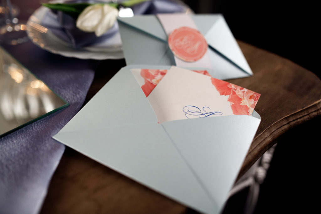 wedding invitations on a table
